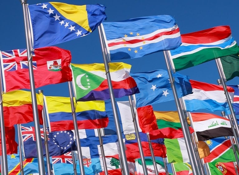Many national flags flying together
