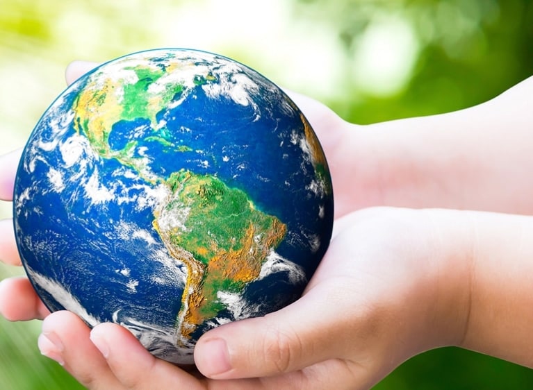 Hands holding the globe