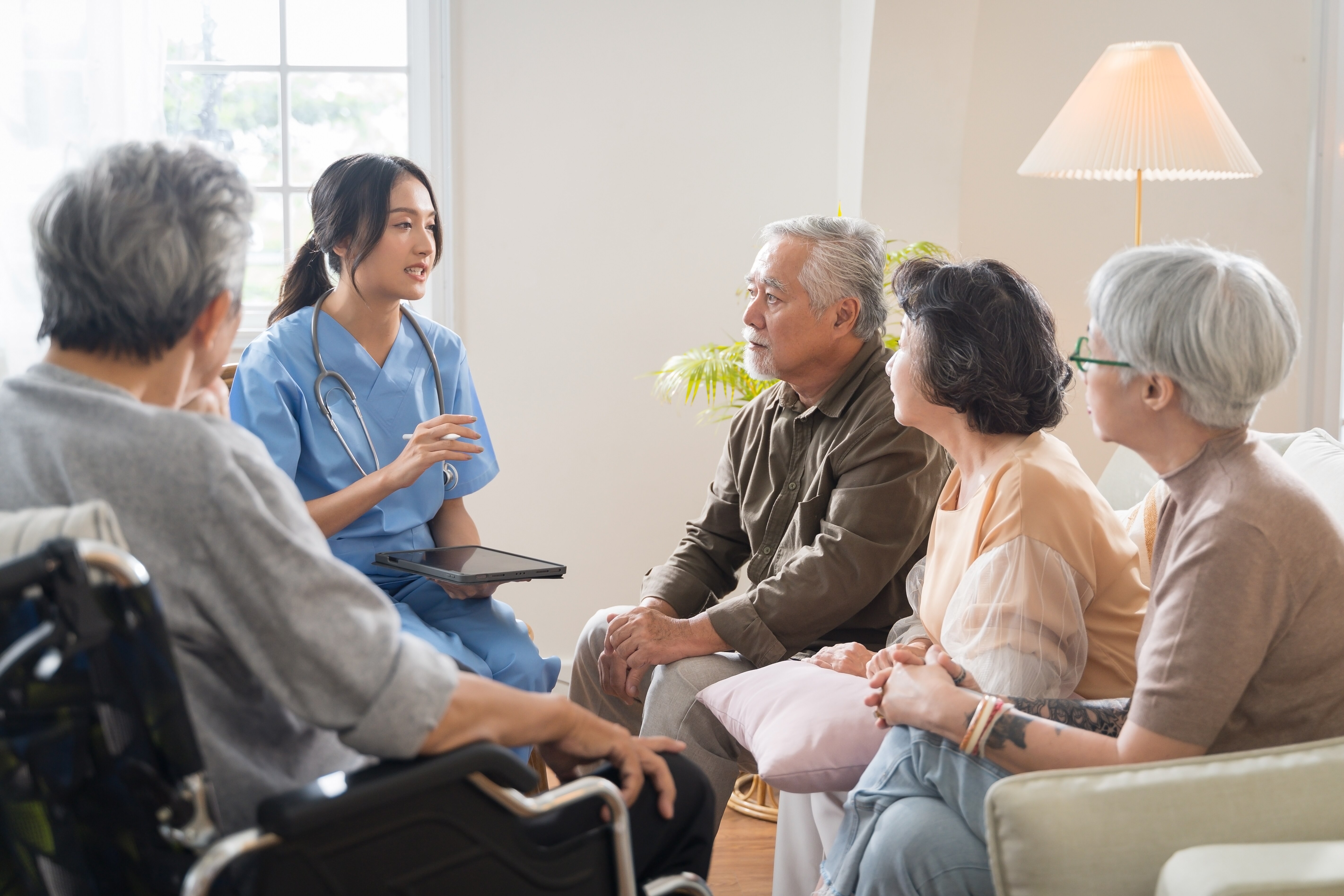 Patients and a healthcare worker at a community health center.