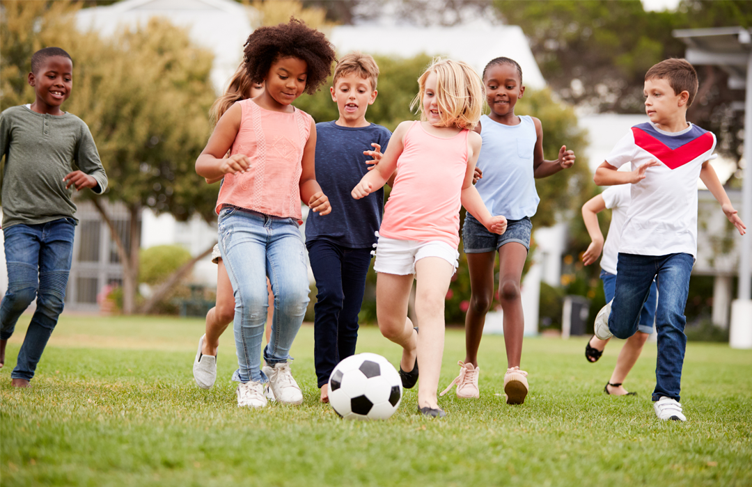 Children playing soccer