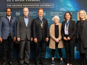 Photo of all the speakers and the two newly installed professors.