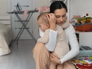 Woman a hugging a baby