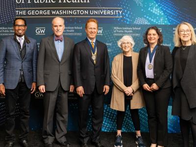 Photo of all the speakers and the two newly installed professors.