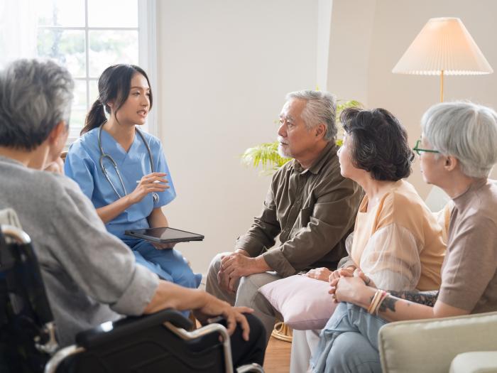 Patients and a healthcare worker at a community health center.
