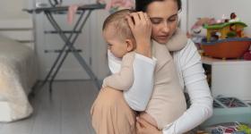 Woman a hugging a baby