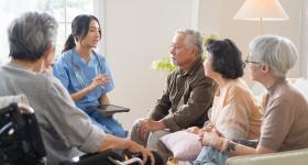 Patients and a healthcare worker at a community health center.